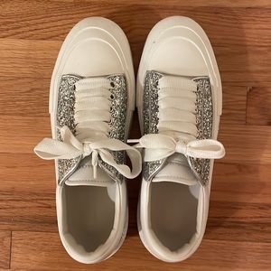 Glittery, white Alexander McQueen sneakers
